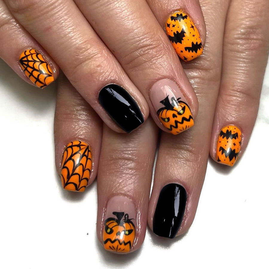 Spooky Halloween Themed Short Length Coffin Shape Black and Orange Press On Nail Set with Pumpkin Design
