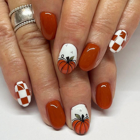 Autumn Festivity Medium Oval Orange Press on Nail Set with White Accents and Pumpkin Design