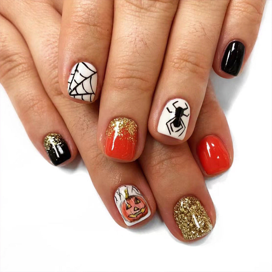 Spooky Elegance Short Length Square Press On Nail Set in Black, White, Orange and Gold with Halloween Glitter Accents