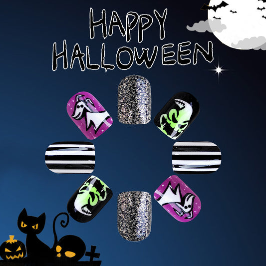 Spooky Elegance Short Length Oval Press On Nail Set In Black Purple And Silver With Glitter Accents And Halloween Themed Designs
