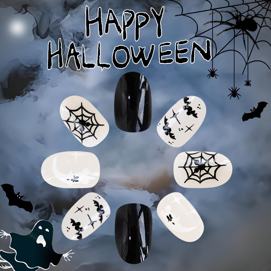 Spooky Elegance Short Oval Black and White Halloween Press On Nail Set with Spider Web Design