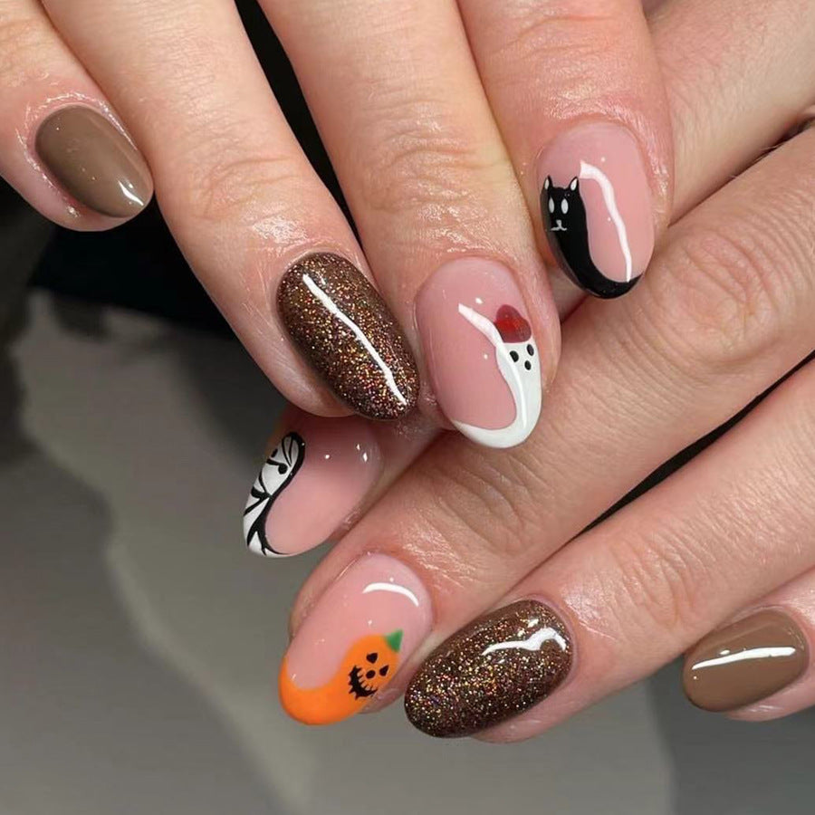Spooky Elegance Medium Oval Multicolor Halloween Themed Press On Nail Set with Glitter Accents and Cute Ghost Designs