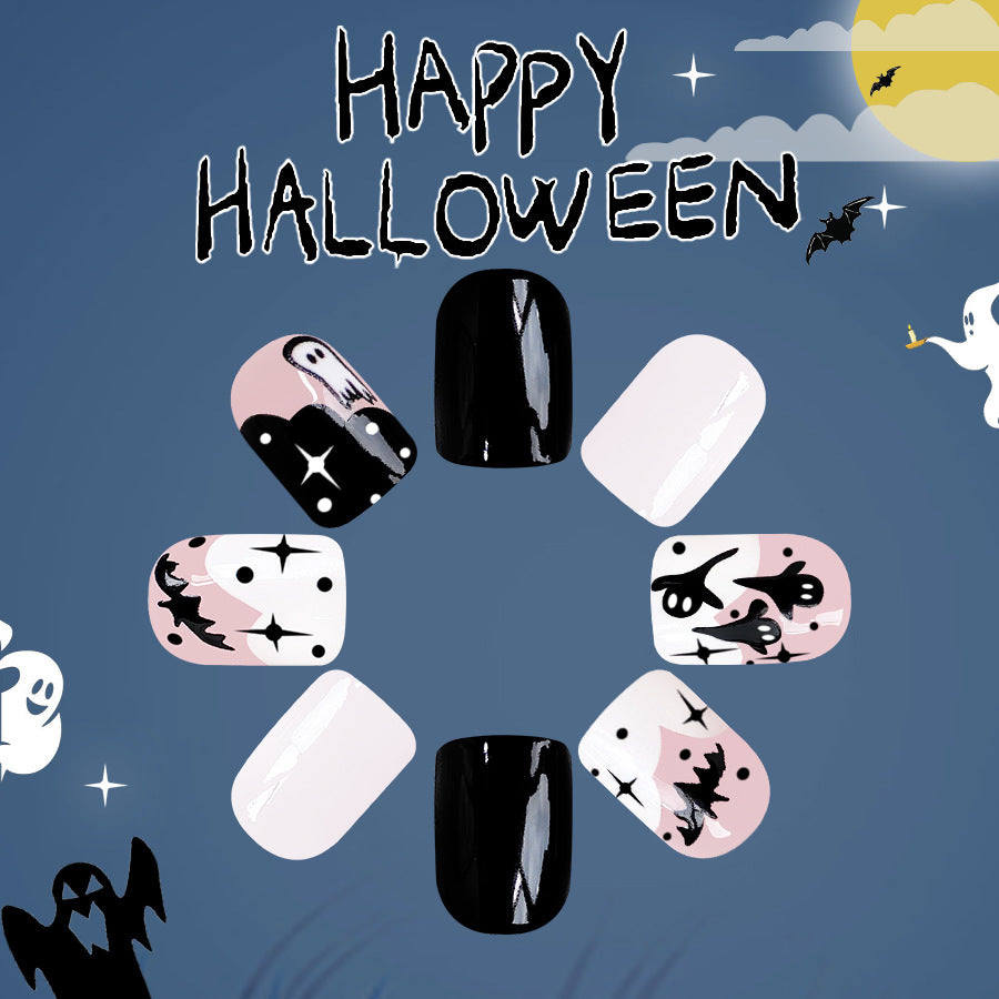 Spooky Elegance Short Oval Black Pink Ghostly Design Press On Nail Set for Halloween Festivities