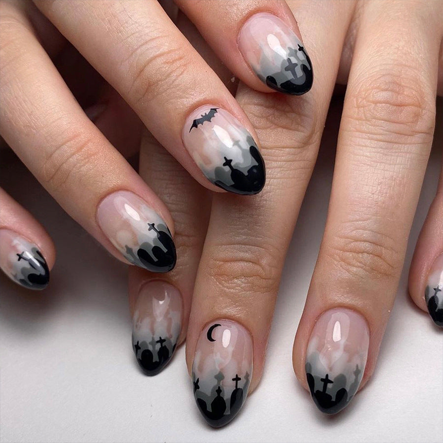 Spooky Elegance Medium Almond Black and White Press On Nail Set with Ghostly Silhouettes Design
