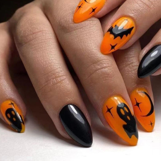 Spooky Elegance Long Almond Black and Orange Ghost-Themed Press On Nail Set with Sparkling Accents