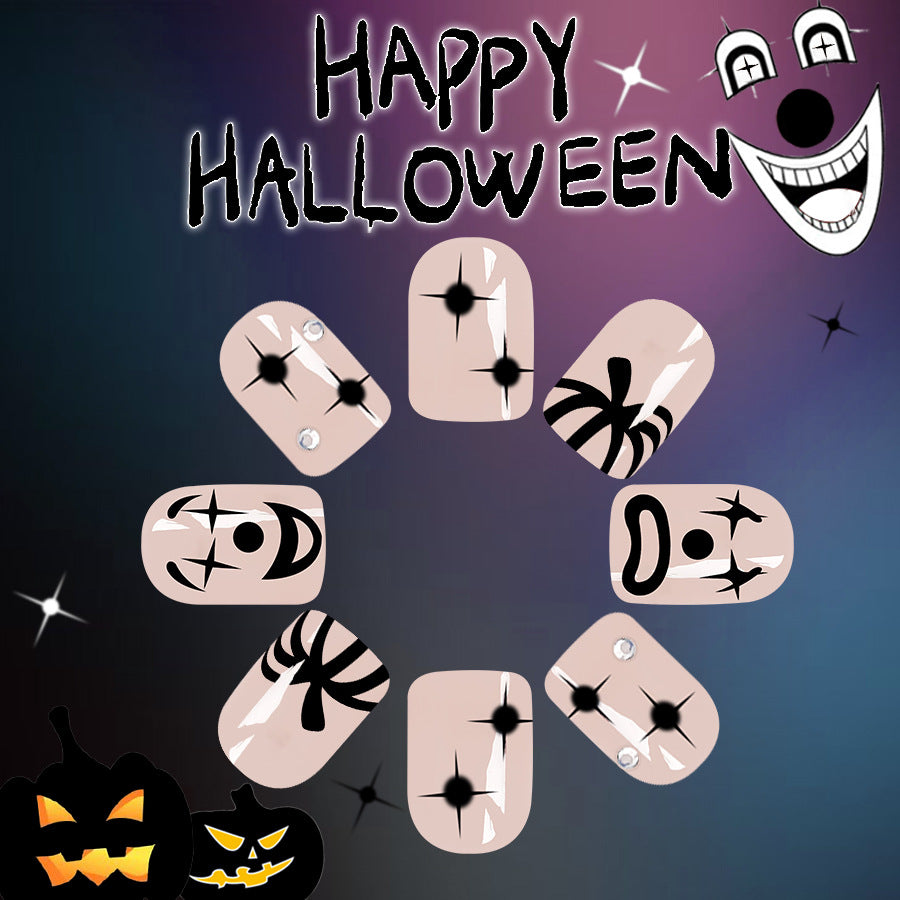 Spooky Elegance Short Oval Beige Press on Nail Set with Rhinestones and Fun Halloween Designs