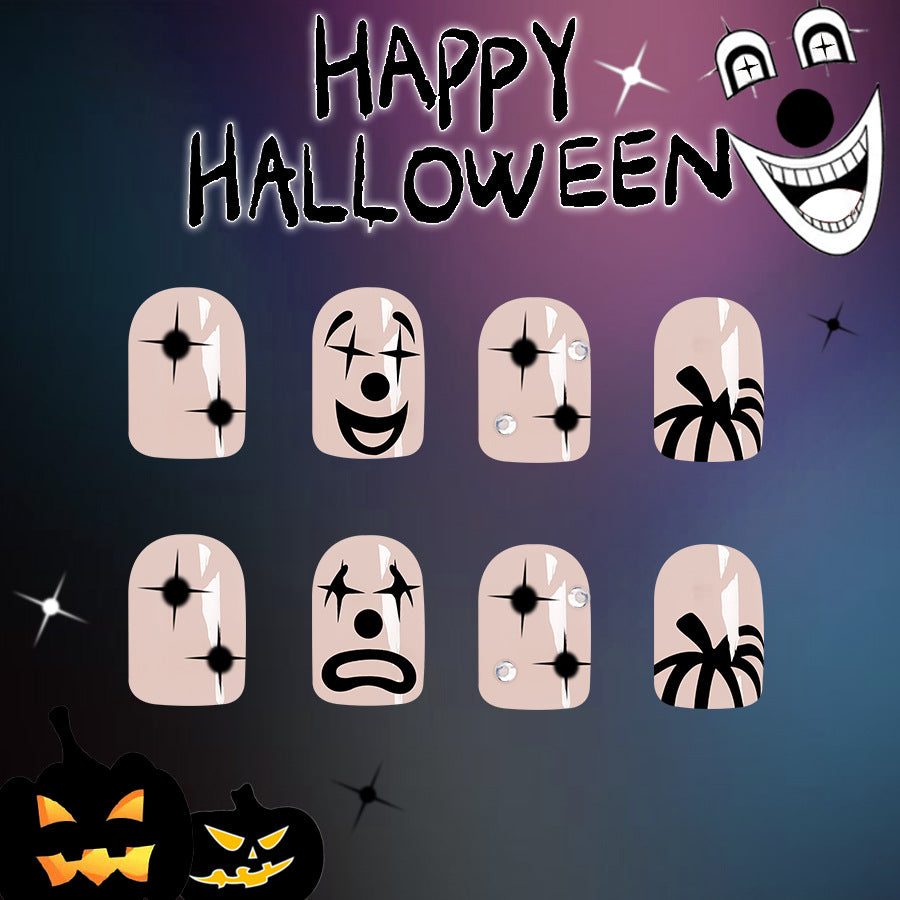 Spooky Elegance Short Oval Pale Pink Press On Nail Set with Halloween-Themed Emojis and Glitter Accents