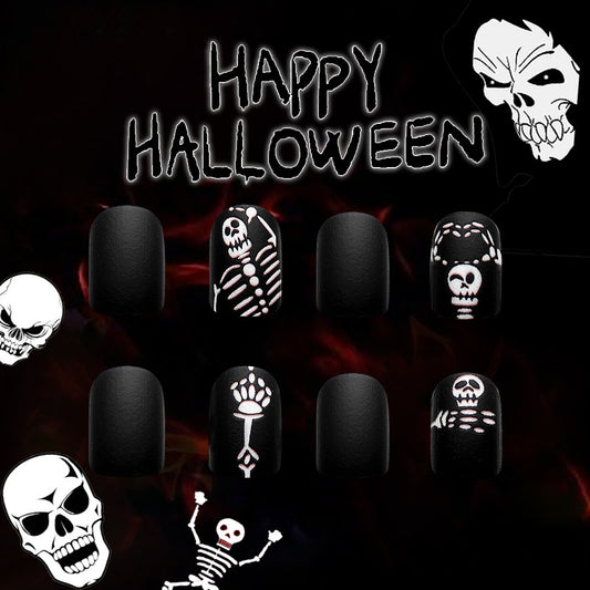 Spooky Elegance Halloween Themed Short Oval Matte Black Press-On Nails with Skeleton Accents