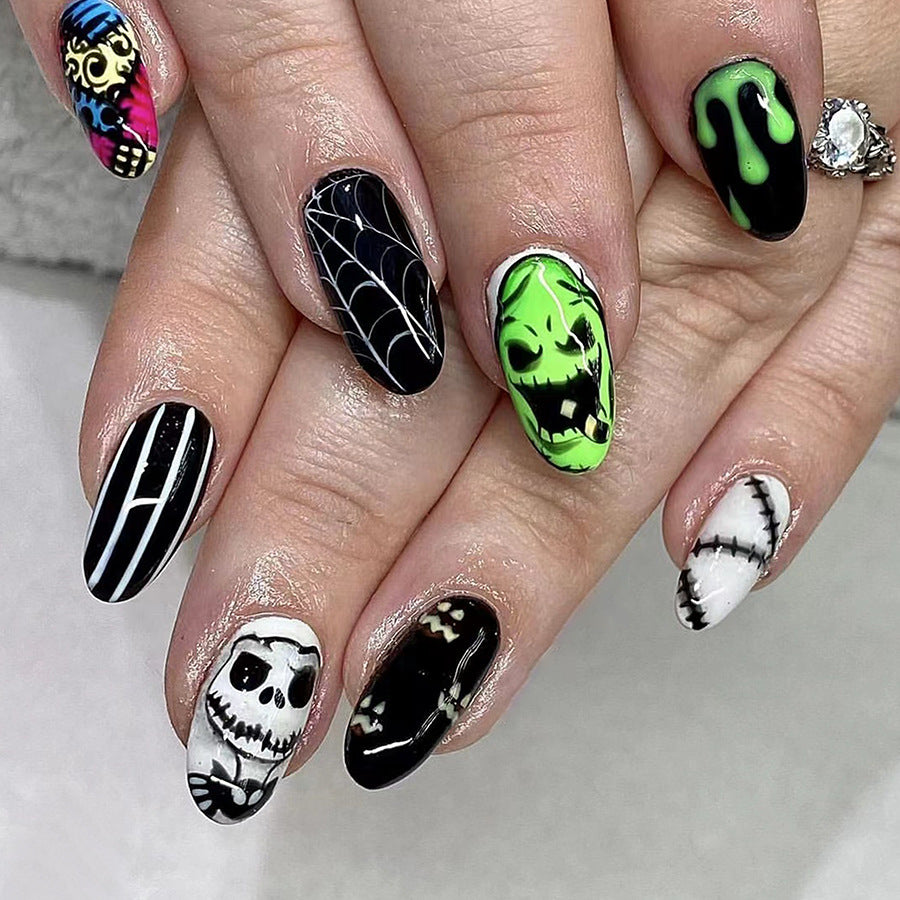 Spooky Elegance Long Oval Black And Green Press On Nail Set With Halloween Themed Artwork Designs