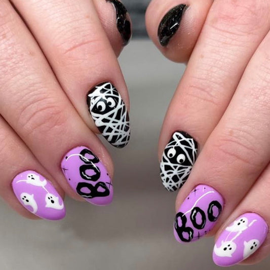 Spooky Elegance Long Oval Black and Purple Halloween-themed Press On Nail Set with Glow-in-the-Dark Accents