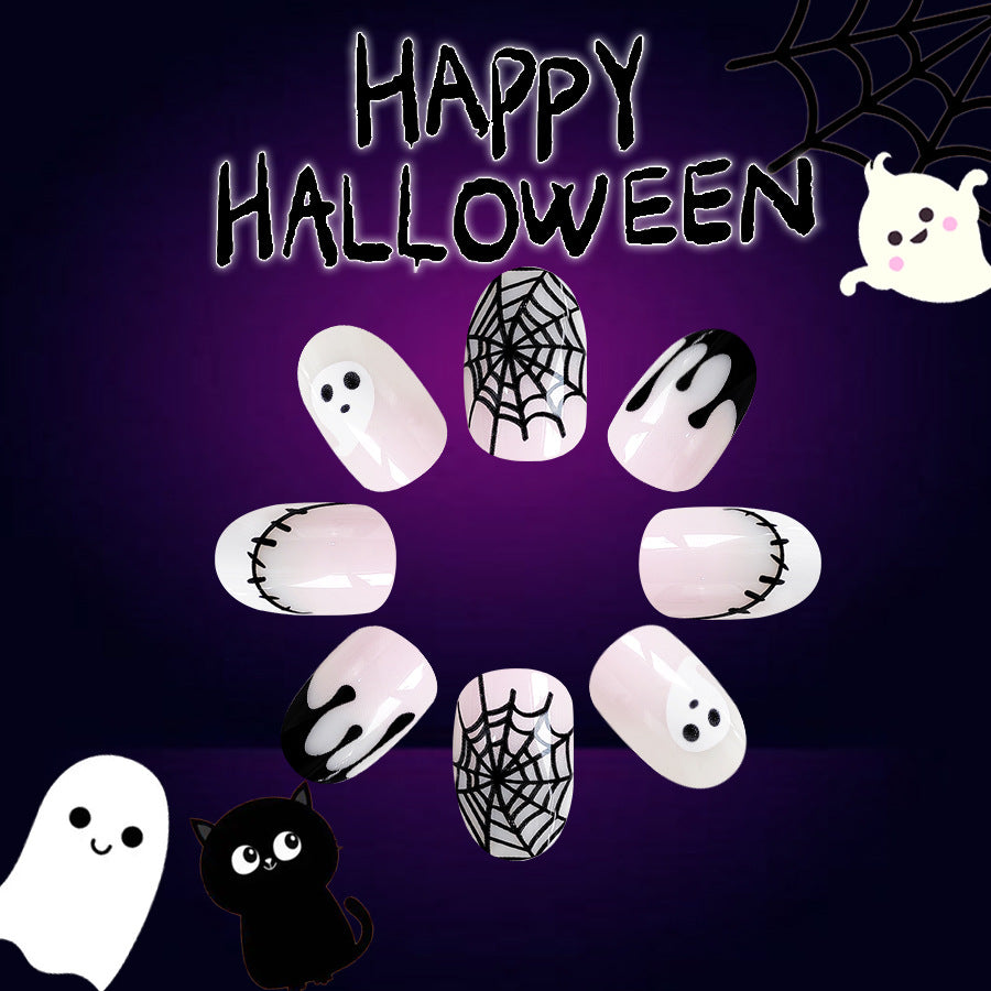 Spooky Elegance Long-Length Oval White Press On Nail Set with Halloween-Themed Artwork