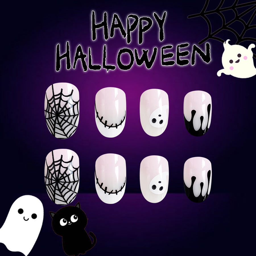 Spooky Elegance Long Oval Pastel Pink Halloween Themed Press On Nail Set with Ghosts and Spider Web Art Design