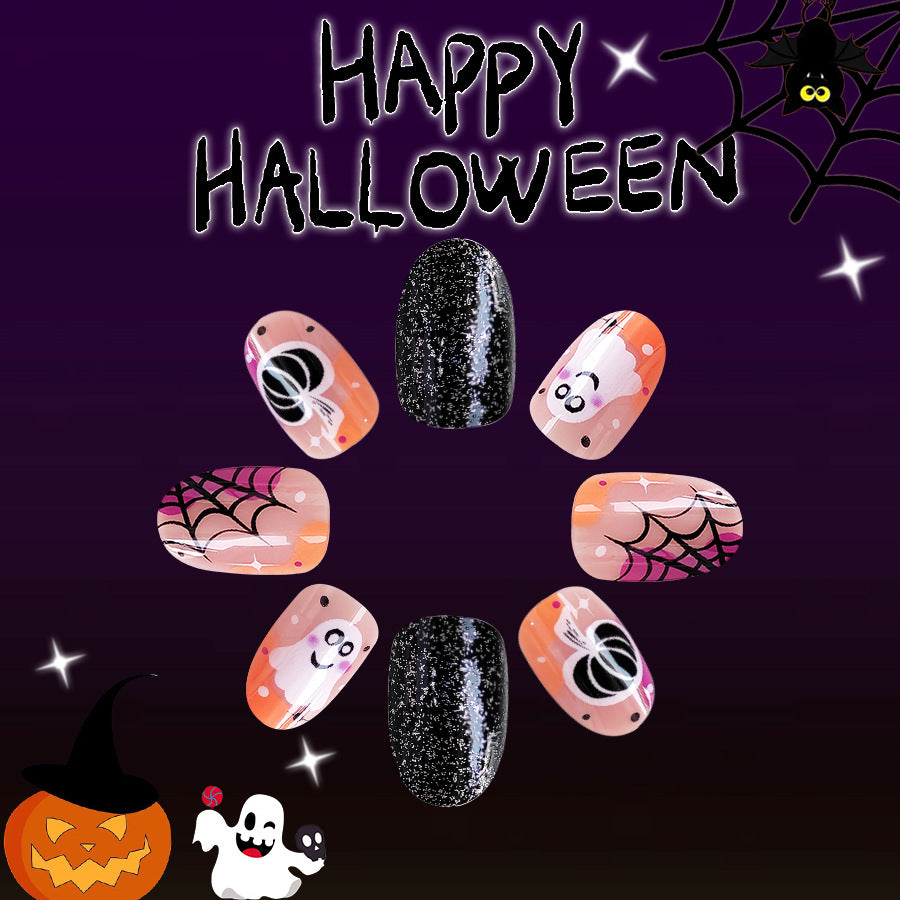A set of Halloween-themed press-on nails featuring a variety of designs including spider webs, ghosts, and pumpkins, predominantly in black and orange colors.