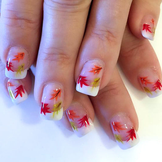 Autumn Delight Medium Square Press On Nail Set in White with Vibrant Red and Green Leaf Designs
