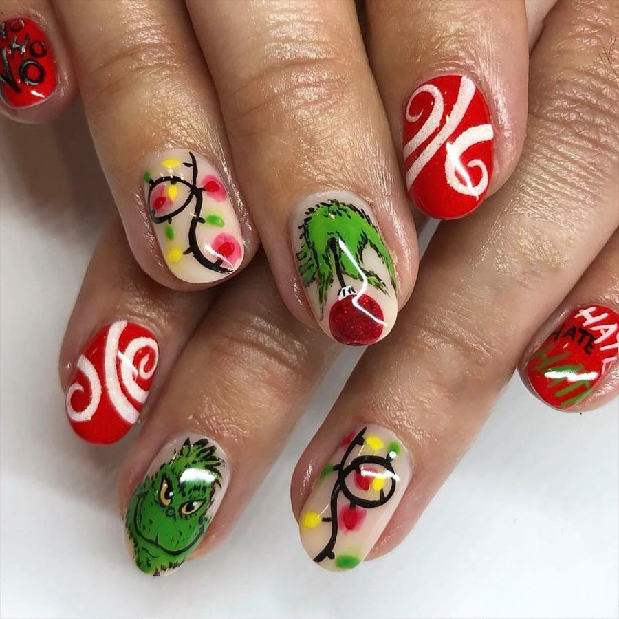 Grinch Holiday Fun Medium Oval Red And Green Press On Nail Set With Festive Christmas Designs