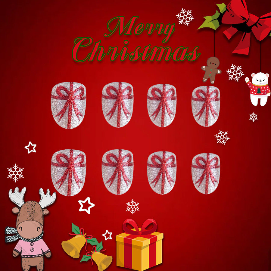 Festive Elegance Short Oval Silver Glitter Press On Nail Set with Red Bow Design