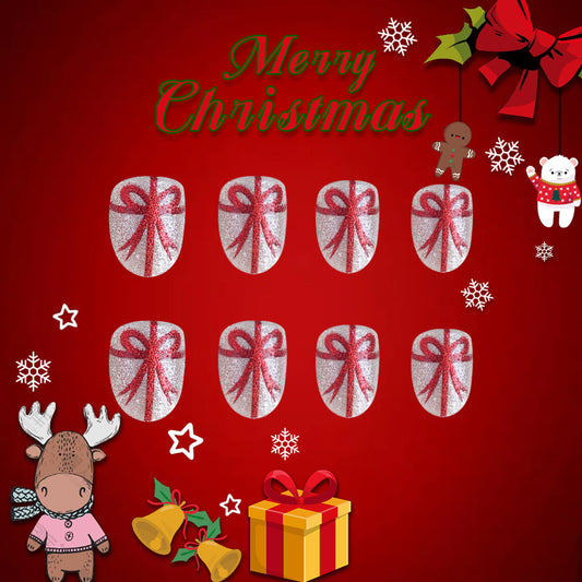 Festive Elegance Short Oval Silver Glitter Press On Nail Set with Red Bow Design