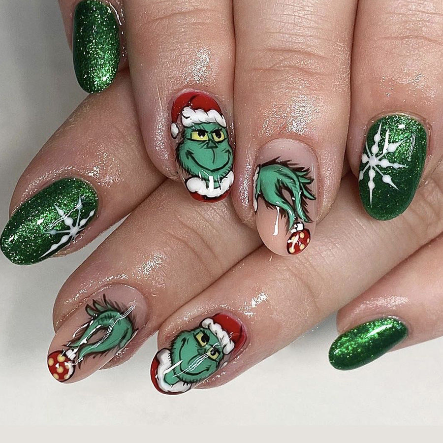 Grinch Inspired Long Oval Shaped Green Glitter Press On Nail Set Featuring Festive Santa Designs