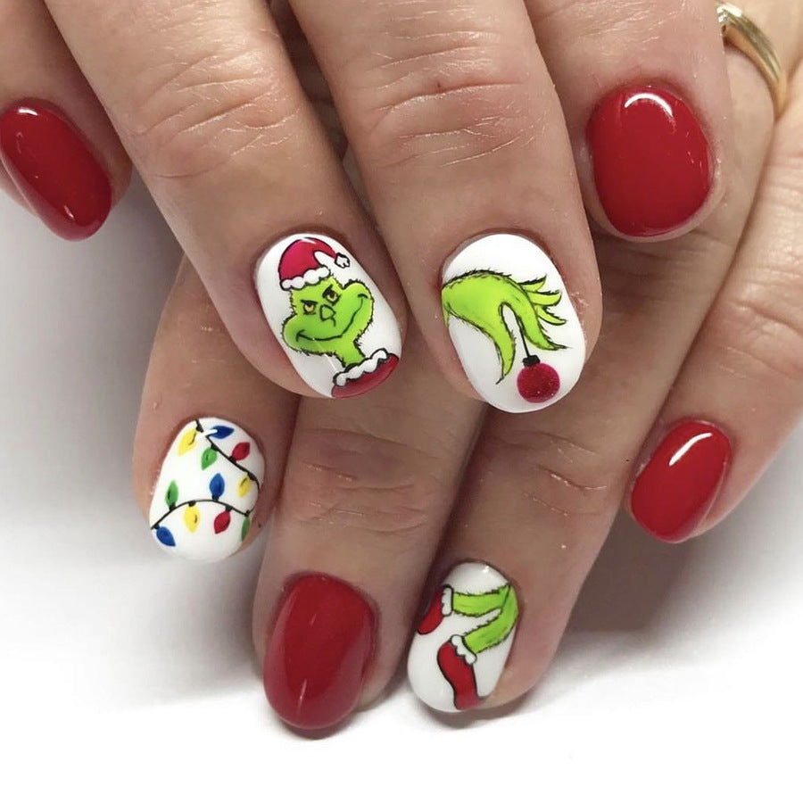 Grinch Inspired Oval Red And White Press On Short Nail Set With Festive Holiday Designs