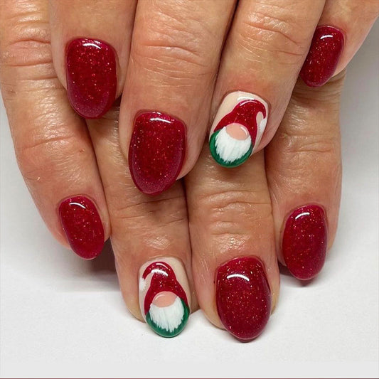 Festive Holiday Sparkle Medium Oval Red Glitter Press On Nail Set with Whimsical Gnome Design