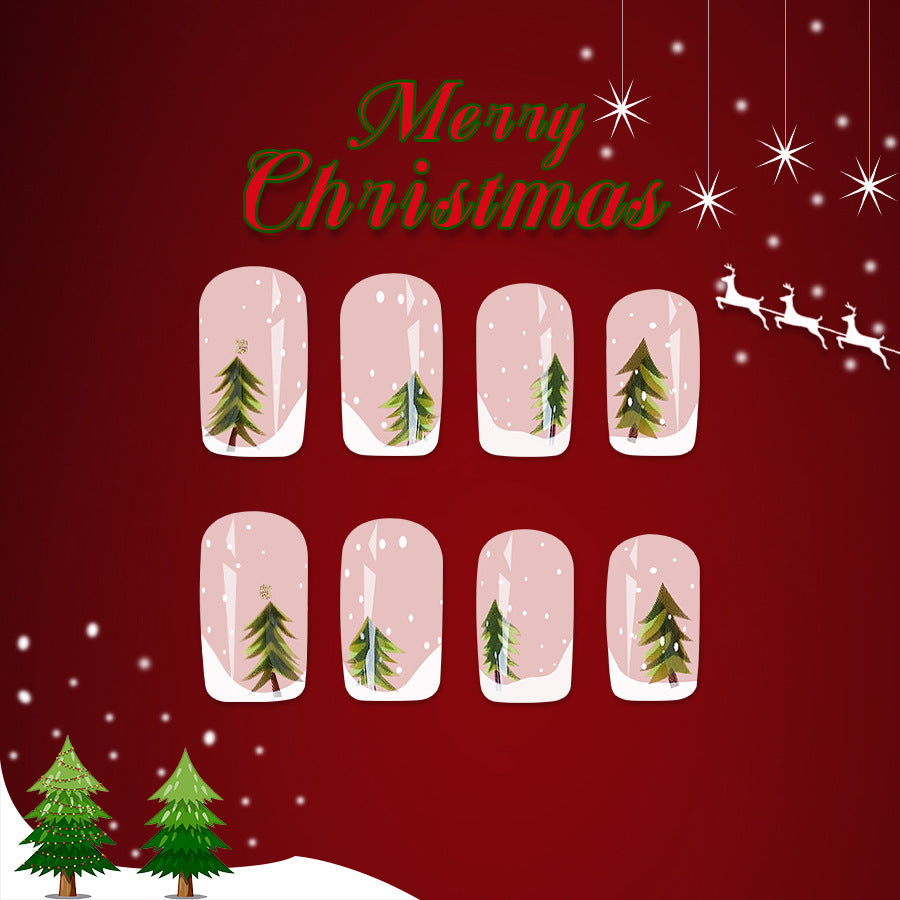Nail art stickers with Christmas tree designs on a red background with festive elements.