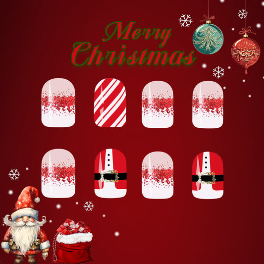 A set of press-on nails in red and white colors with glitter, featuring festive Christmas-themed designs including Santa Claus and reindeer motifs.