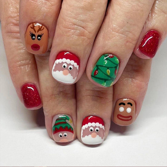 Nail art with Christmas-themed designs on a white background