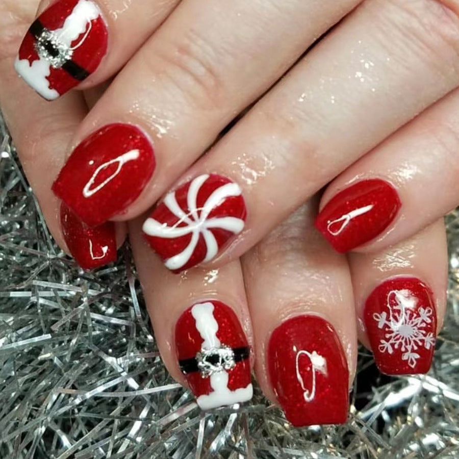Festive Winter Wonderland Coffin Red Medium Press On Nail Set Featuring Candy Cane and Santa Designs