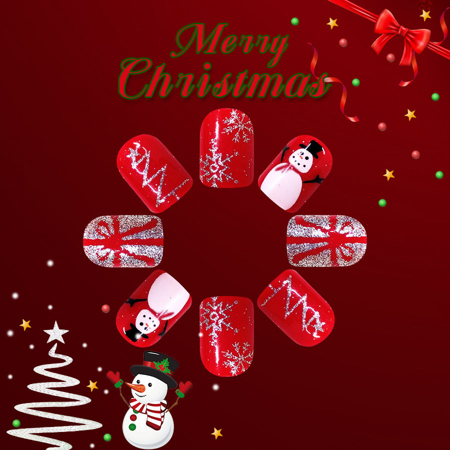 Christmas-themed nail art designs on a red background with snowmen and festive patterns.