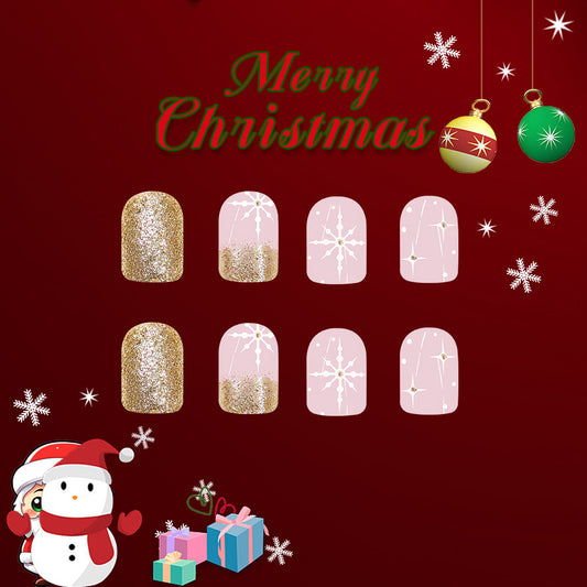 Festive Glamour Short Squoval Pink and Gold Sparkling Nail Set with Snowflake Design