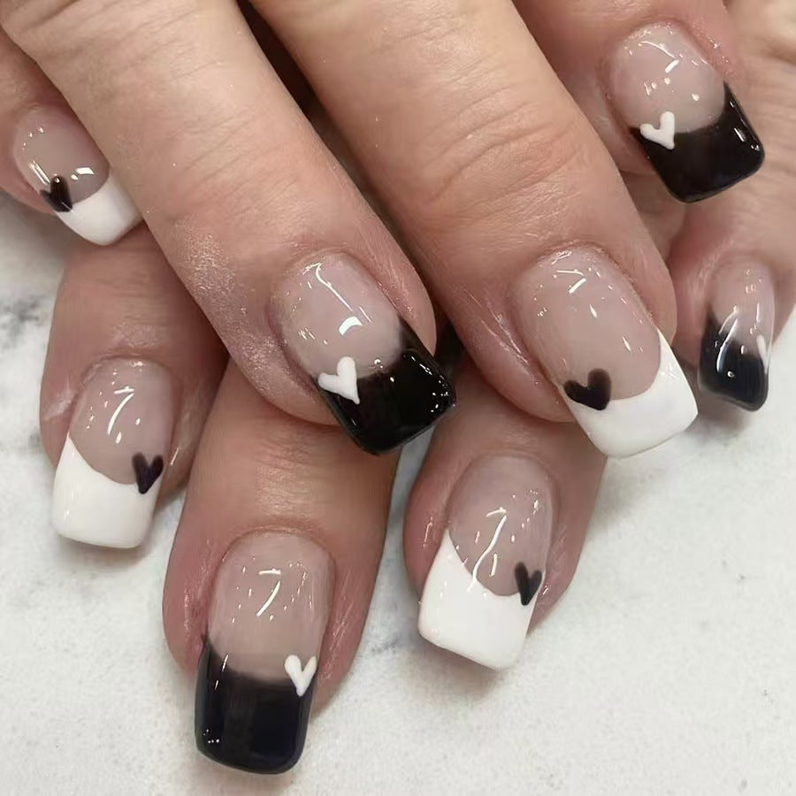 Charming Elegance Square Press On Nail Set in Short featuring Black and White Tips with Delightful Heart Accents