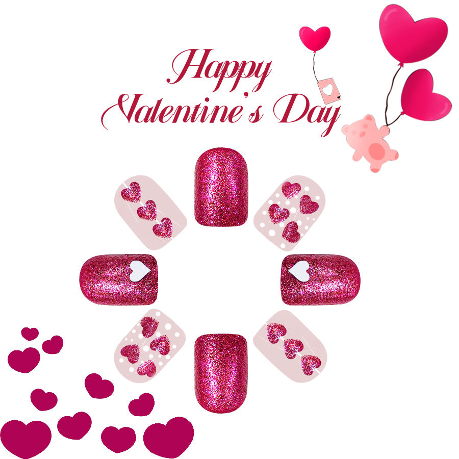 Valentine's Day-themed nail art with pink glitter nails, heart designs, and 'Happy Valentine's Day' text on a white background.