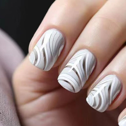 Whimsical Elegance Medium Square White Press On Nail Set with Unique Abstract Cutout Design