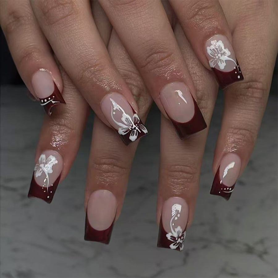 Chic Floral Elegance Medium Square Burgundy Press On Nail Set with Intricate White Designs