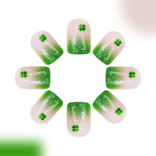 Lucky Charm Press On Nail Set Featuring Short Square Green Ombre Design with Glitter and Clover Accents