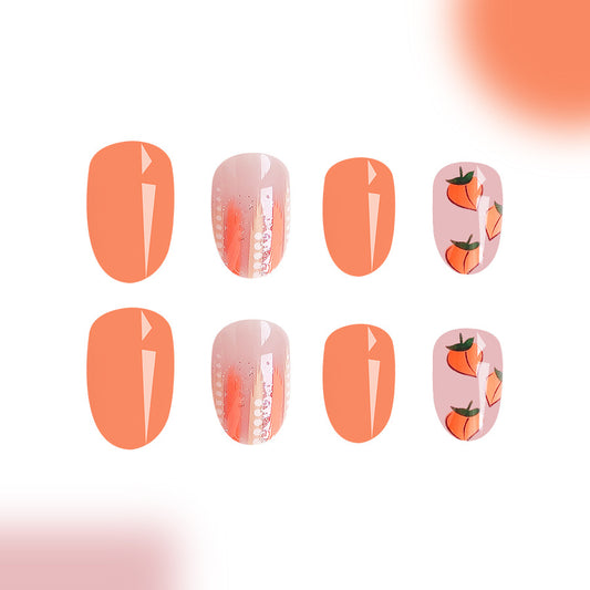 Peachy Dreamland Glossy Short Oval Press On Nail Set in Soft Coral with Charming Fruit Décor