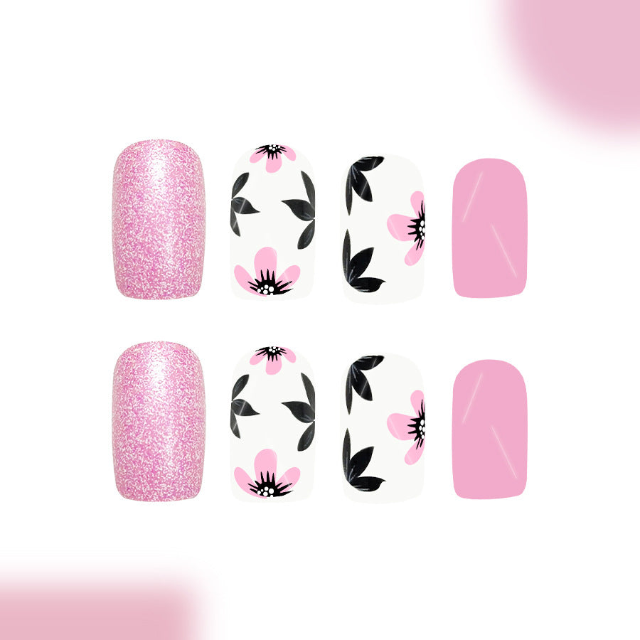 Whimsical Blossom Pink Medium Square Glitter Press On Nail Set with Floral Accents and Elegant Design