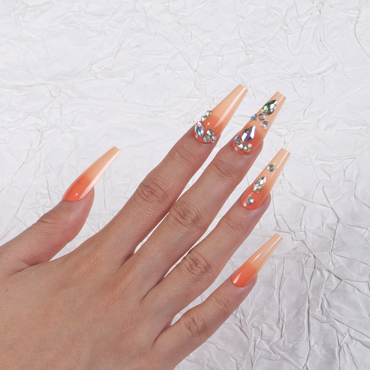 Glamorous Sunset Long Coffin Peach Press On Nail Set with Shimmering Rhinestone Accents