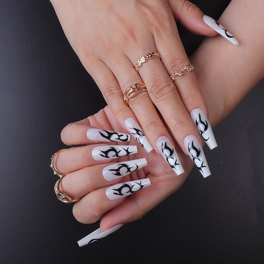 Flaming Elegance Long Coffin White Press On Nail Set with Black Flame Design for Bold Style