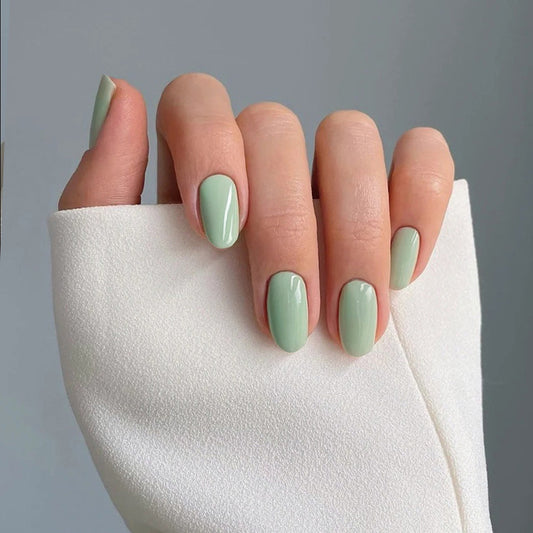 Serene Oasis Elegant Medium Round Shaped Soft Green Press-On Nail Set with Glossy Finish