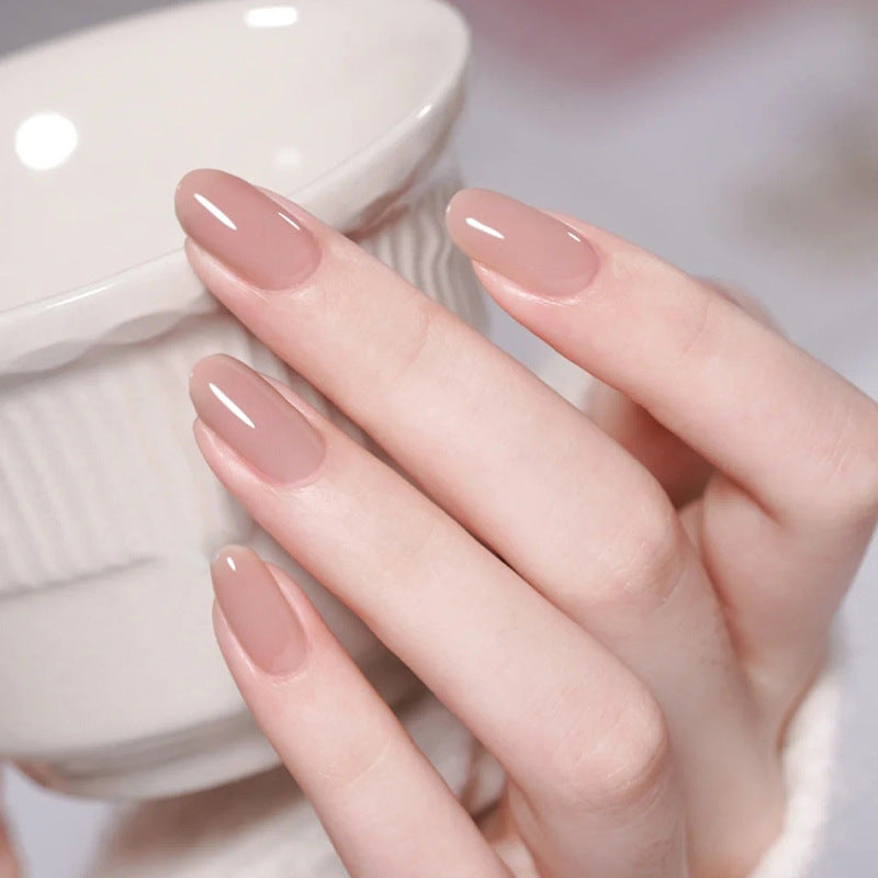 Elegant Harmony Medium Oval Beige Press On Nail Set with Glossy Finish
