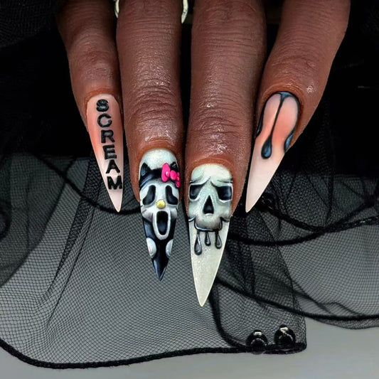 Gothic Glamour Long Stiletto Black and White Nail Set with Unique Skull and Scream Design
