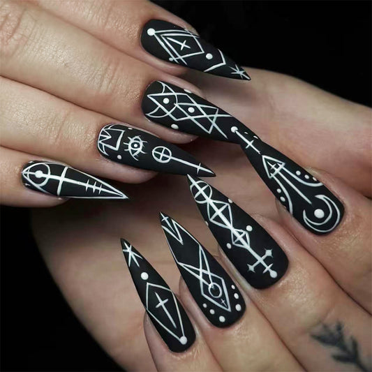 Mystical Elegance Long Stiletto Black Nail Set with Intricate White Geometric Designs