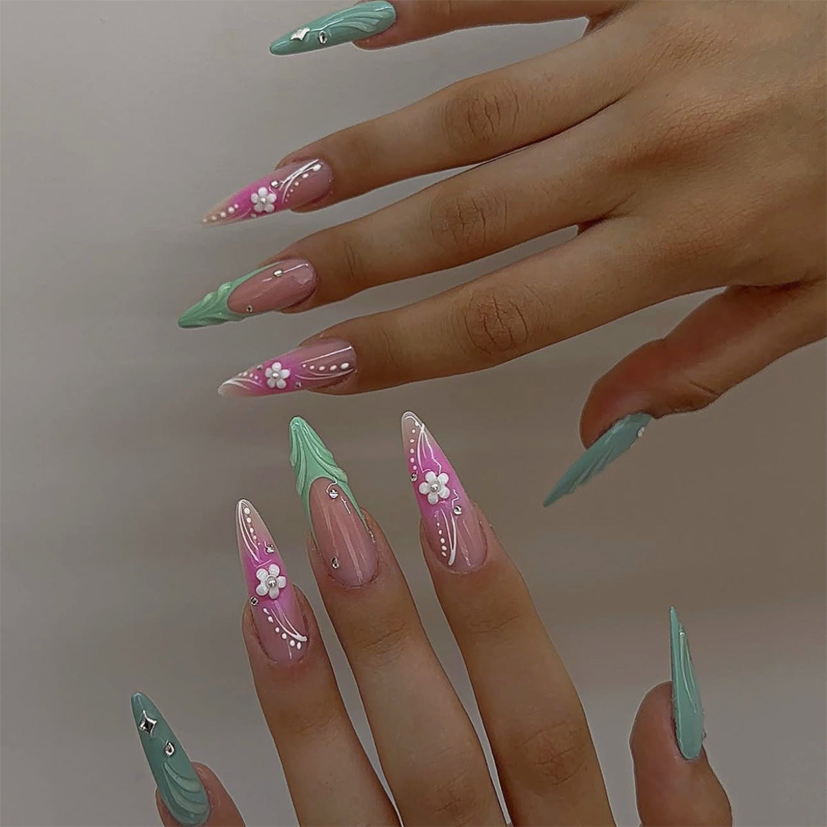 Whimsical Floral Fantasy Long Stiletto Mint Green and Pink Nails with Delicate Flower Accents