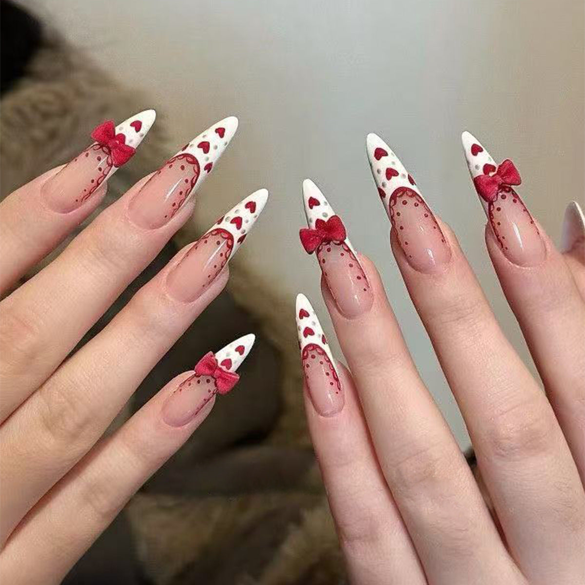 Charming Romance Long Stiletto Red and White Nail Set with Adorable Bow Accents