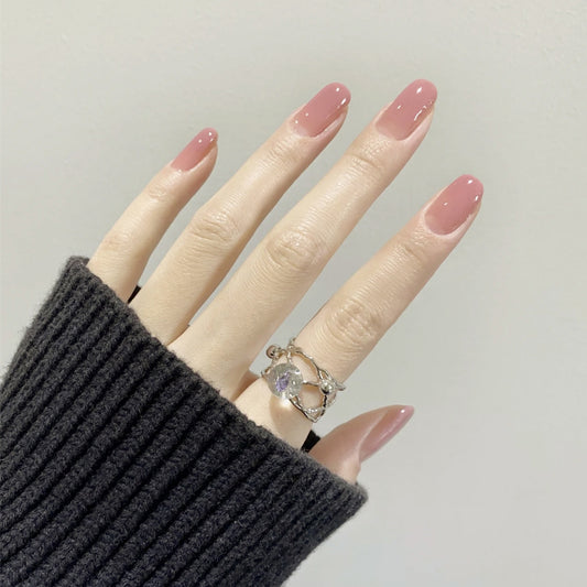 Elegant Sophistication Long Oval Pale Pink Press On Nail Set with Glossy Finish