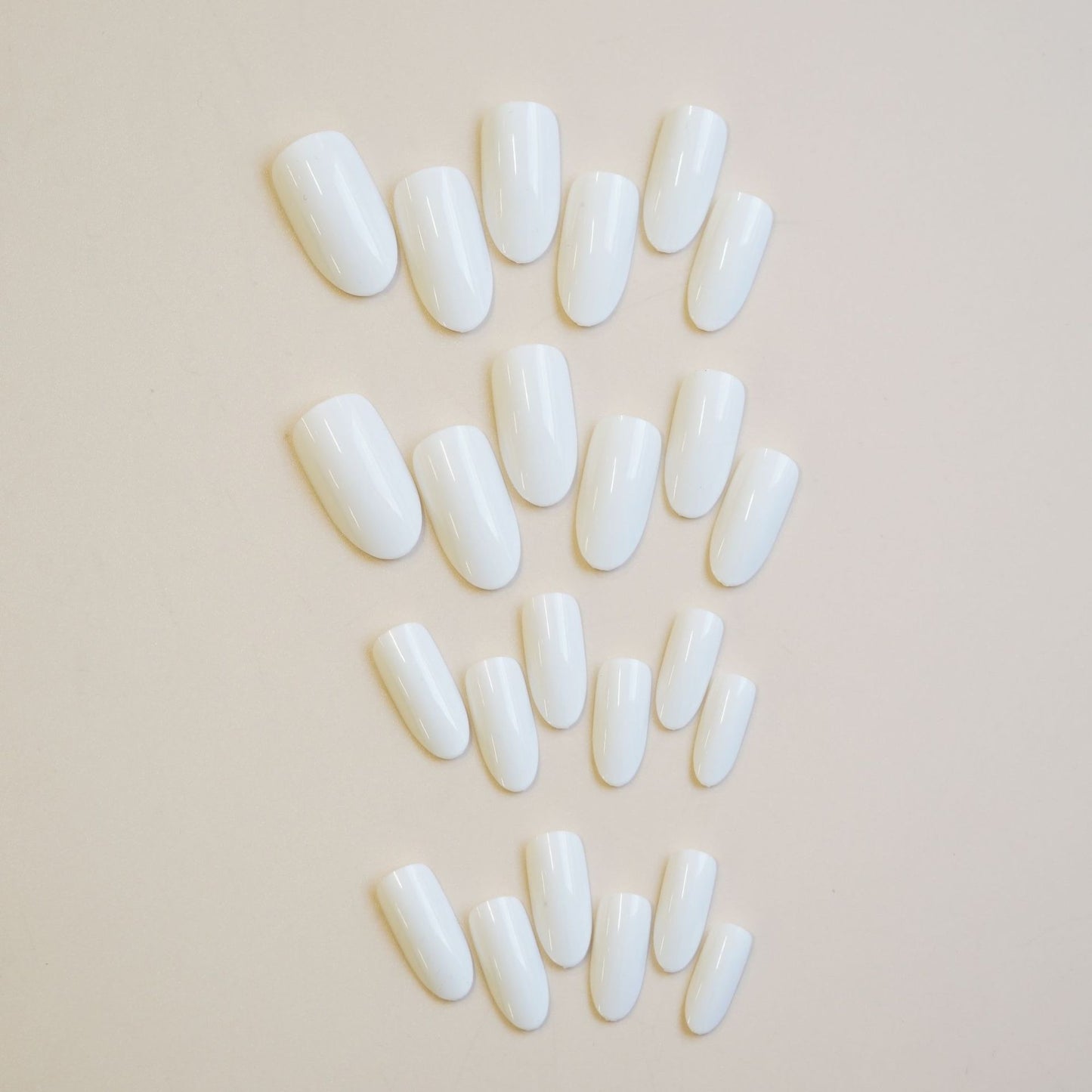 Elegant Oasis Glossy Long Oval White Press On Nail Set with Extra Strength Adhesive