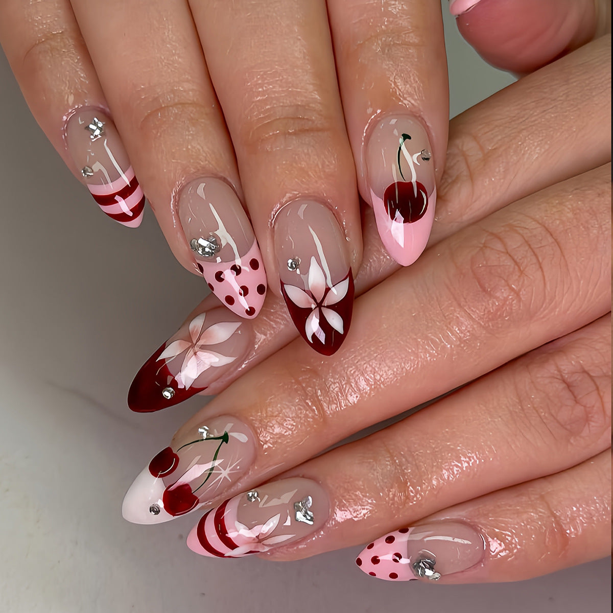 Cherry Blossom Dream Medium Almond Pink and Red Nail Set with Floral Accents