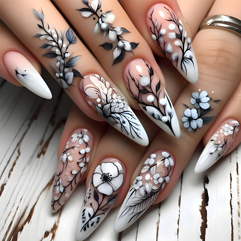 Enchanting Floral Elegance Long Almond White and Black Nail Set with Exquisite Hand-Painted Botanical Designs