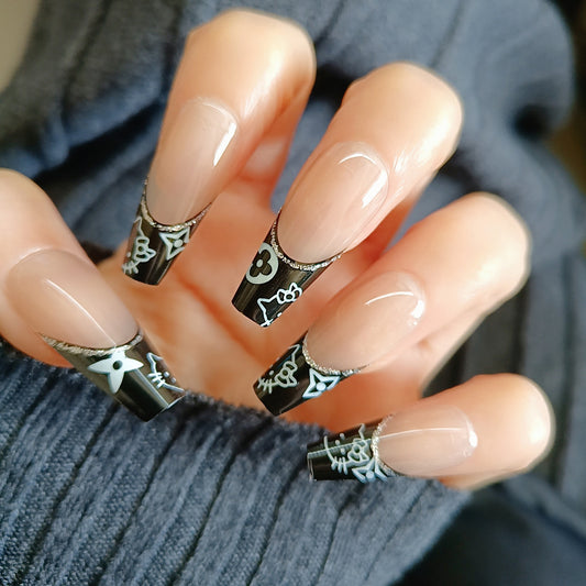 Gothic Enchantment Elegant Long Coffin Black and Clear Press-On Nails with Adorable Cat and Star Designs